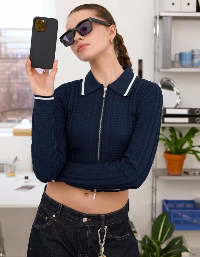 Giacca con zip e colletto polo lavorato a trecce