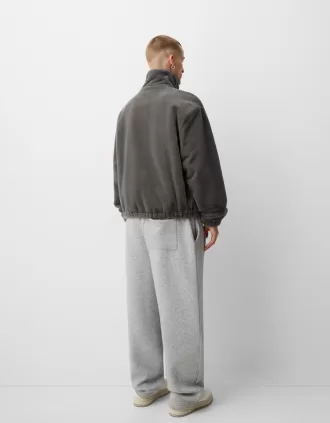 Giacca in pelliccia sintetica a collo alto con cerniera