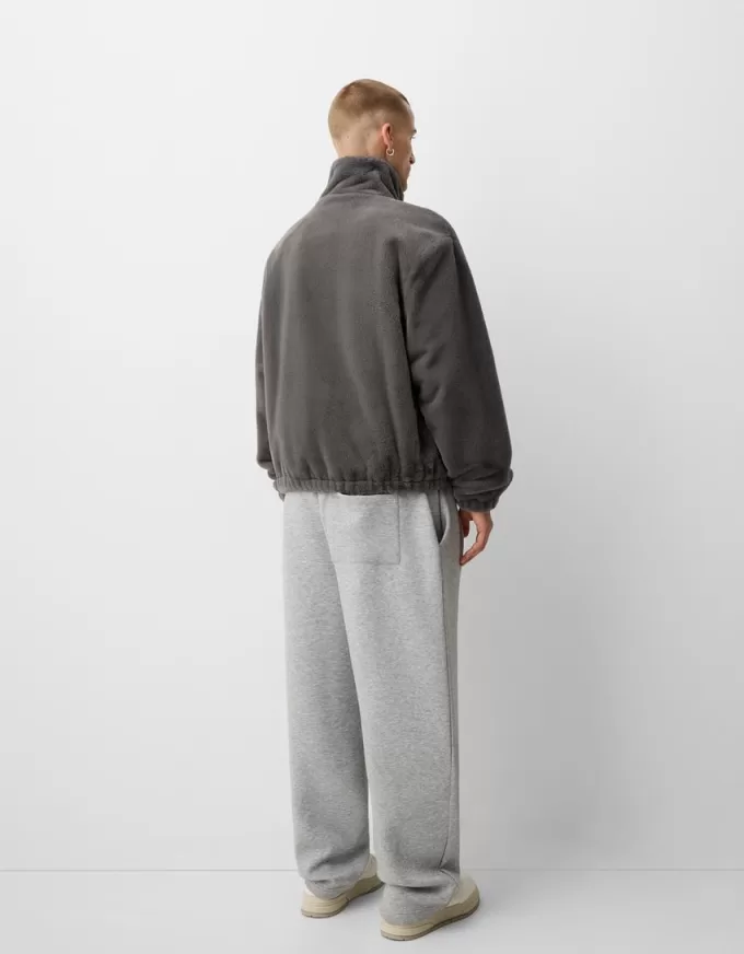 Giacca in pelliccia sintetica a collo alto con cerniera