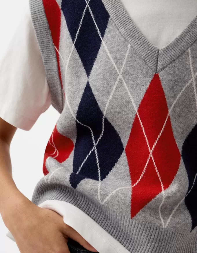 Gilet con scollo a V con motivo a rombi