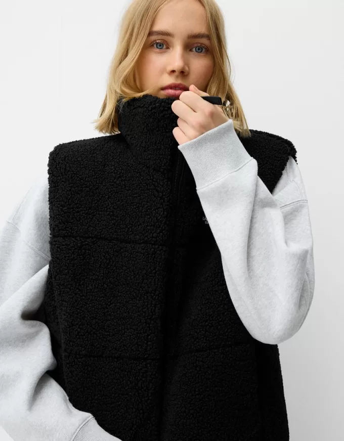 Gilet reversibile in montone sintetico