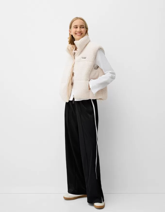 Gilet reversibile in montone sintetico