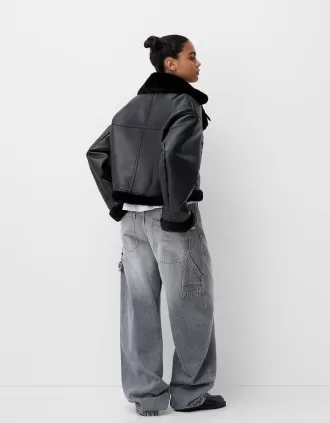 Giubbotto biker in montone sintetico