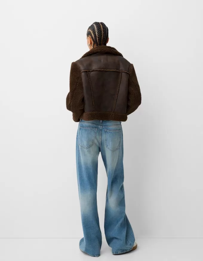 Giubbotto double face con maniche in finto montone