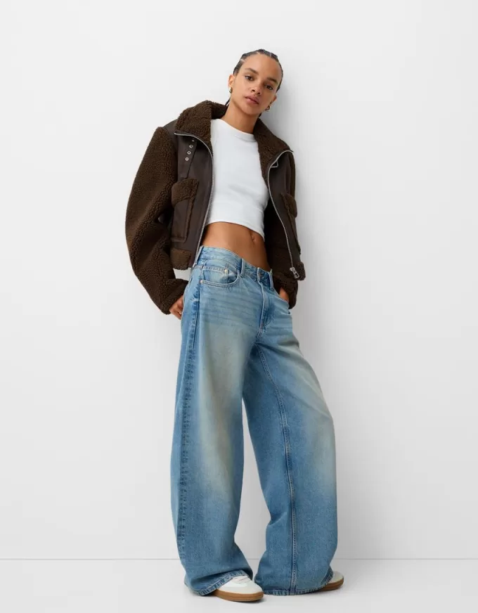 Giubbotto double face con maniche in finto montone