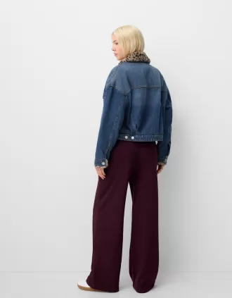 Giubbotto in denim con collo in ecopelliccia stampa animalier