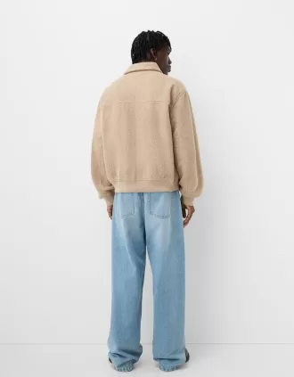 Giubbotto in montone sintetico