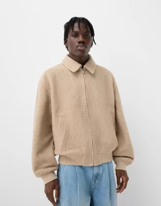 Giubbotto in montone sintetico