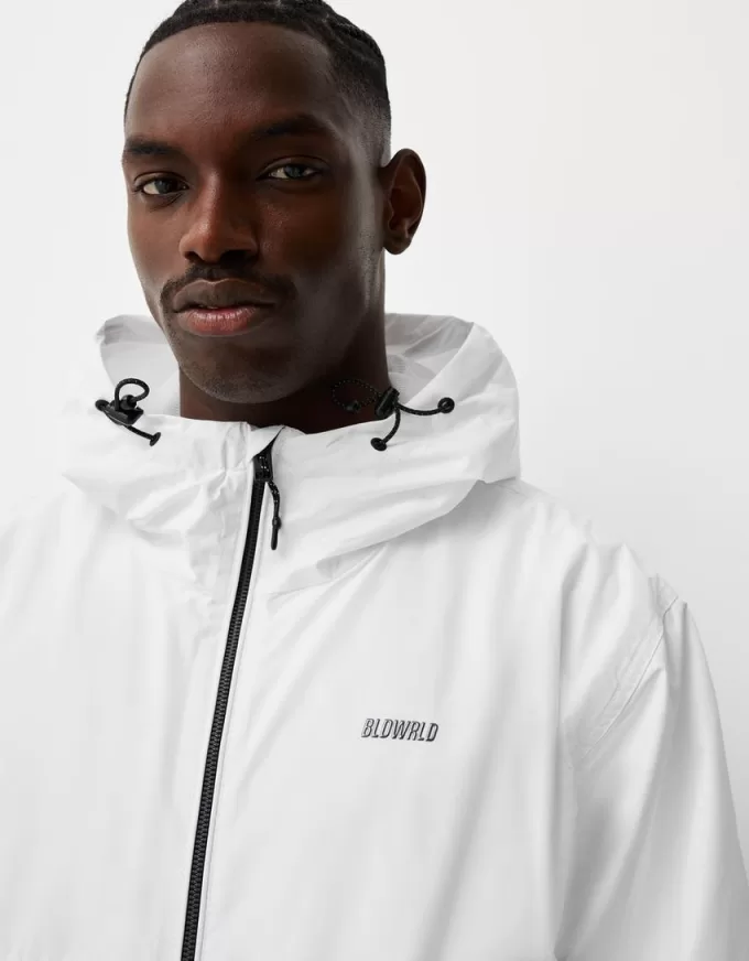 Giubbotto tecnico con cappuccio