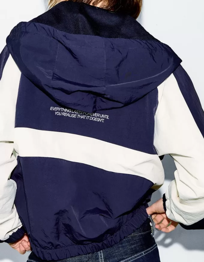 Giubbotto tecnico con cappuccio