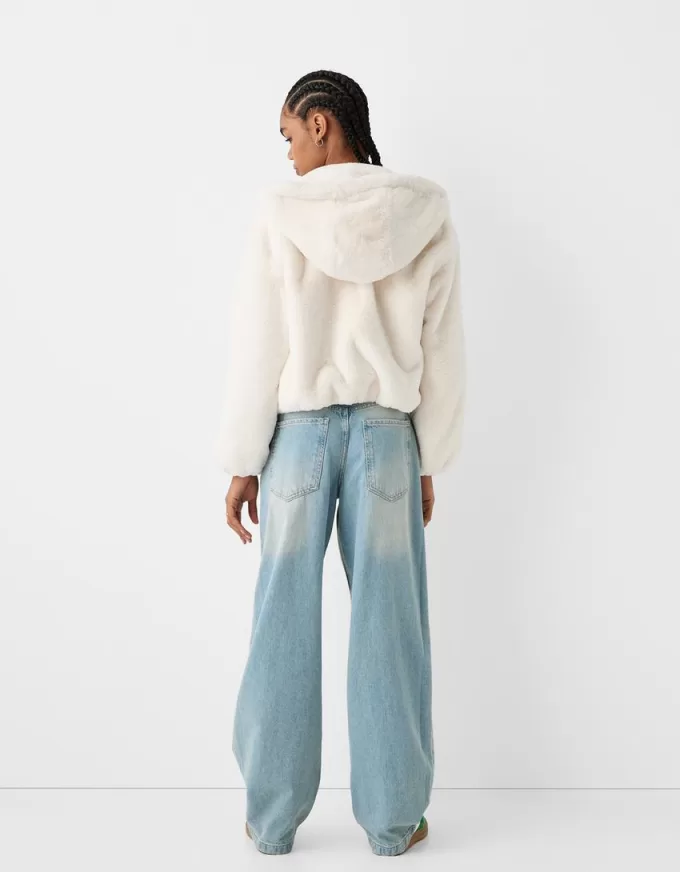 Giubbotto trapuntato con cappuccio in pelliccia sintetica