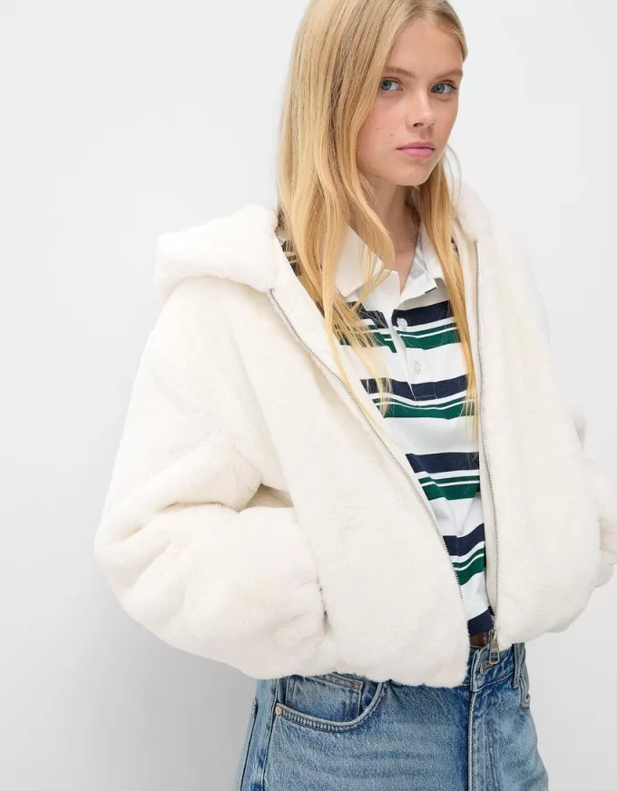 Giubbotto trapuntato con cappuccio in pelliccia sintetica