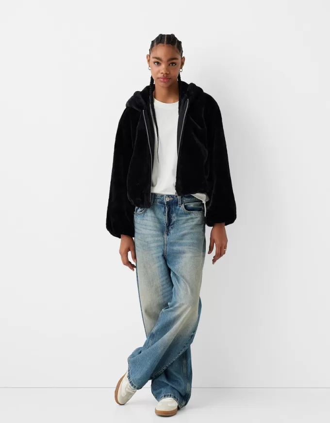 Giubbotto trapuntato con cappuccio in pelliccia sintetica