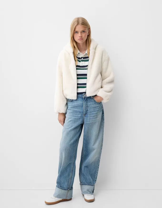 Giubbotto trapuntato con cappuccio in pelliccia sintetica