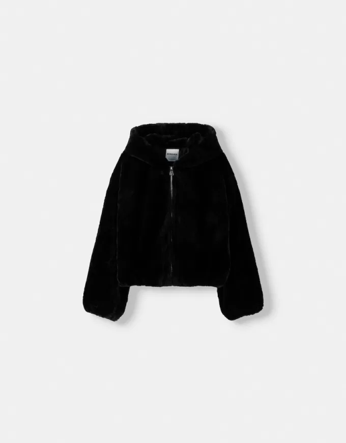 Giubbotto trapuntato con cappuccio in pelliccia sintetica