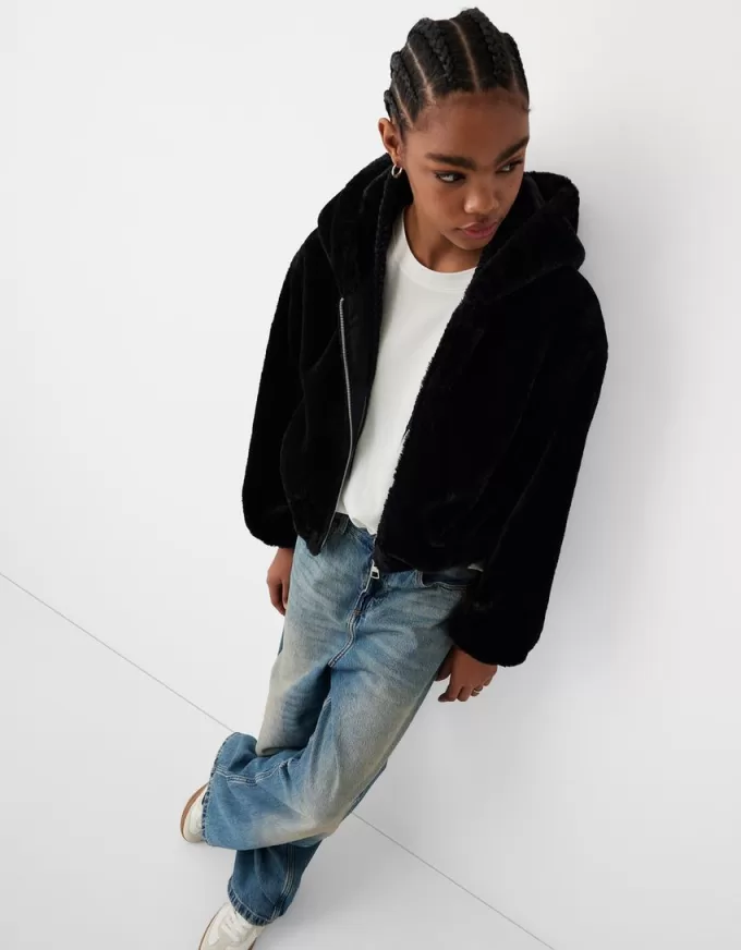 Giubbotto trapuntato con cappuccio in pelliccia sintetica