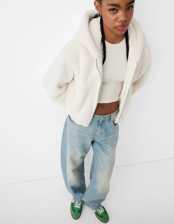 Giubbotto trapuntato con cappuccio in pelliccia sintetica