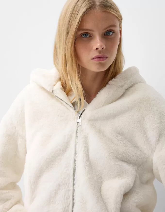 Giubbotto trapuntato con cappuccio in pelliccia sintetica