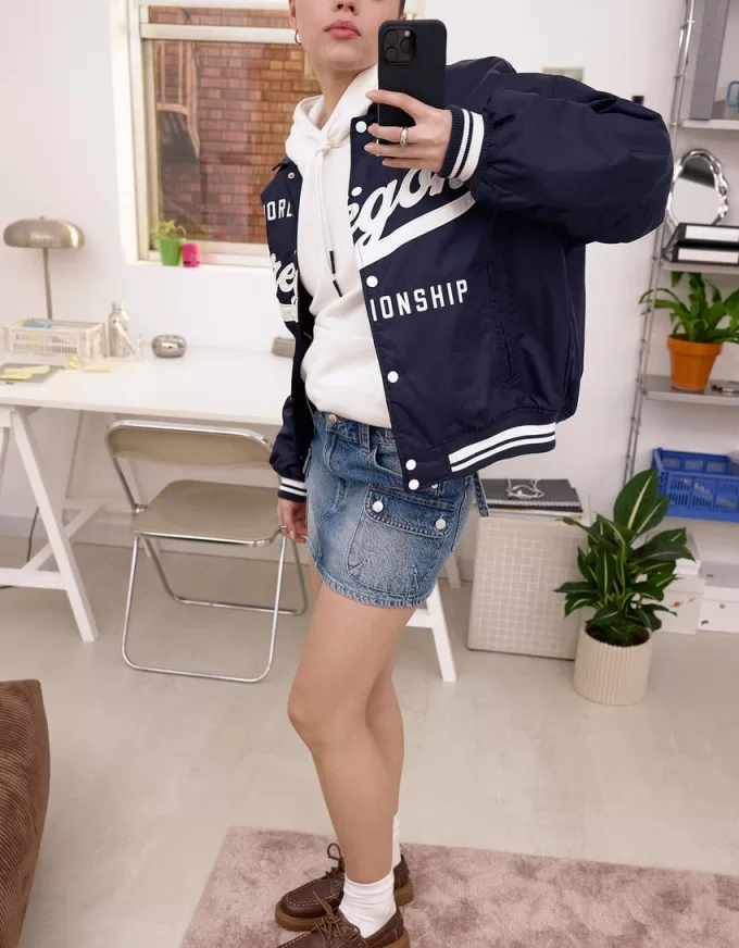 Gonna cargo in denim con spalline