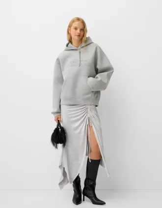 Gonna midi asimmetrica con volant