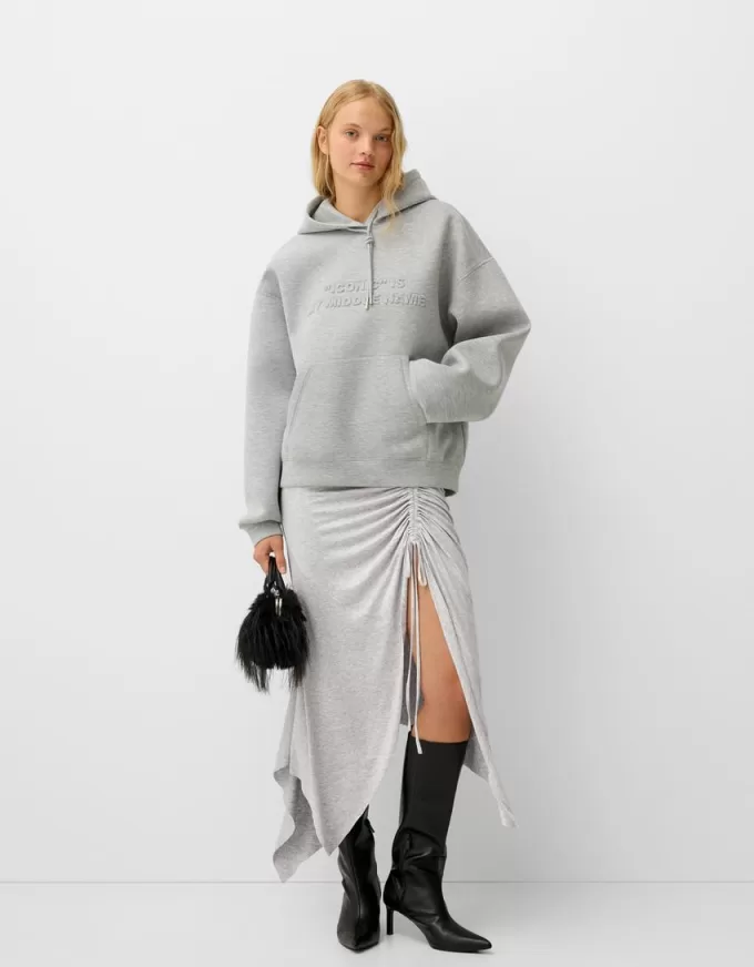 Gonna midi asimmetrica con volant