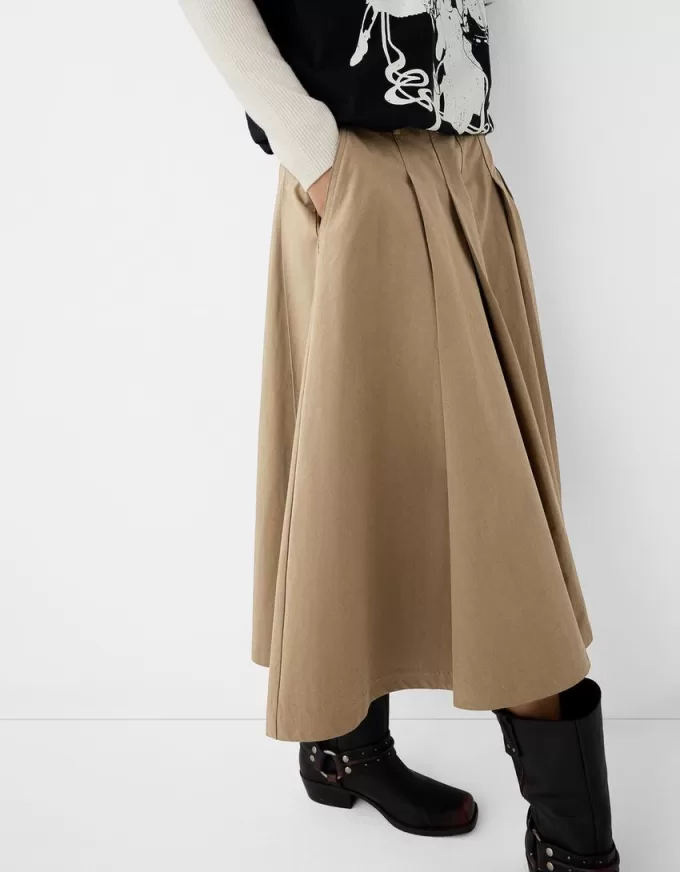 Gonna midi con pieghe a cannoncino e tasche