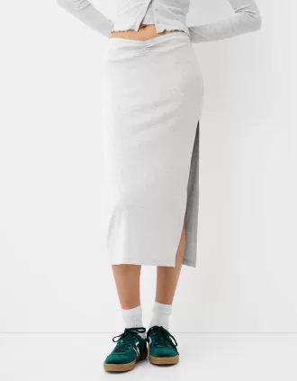 Gonna semilunga arricciata