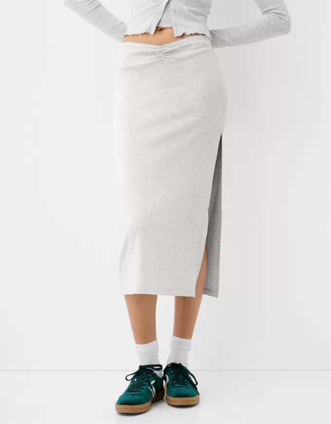 Gonna semilunga arricciata