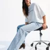 Jeans a gamba larga anni ’90 con strass