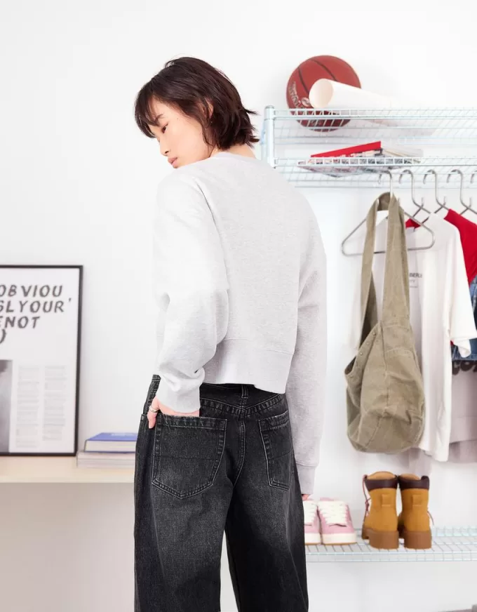 Jeans anni ’90 a gamba larga con risvolto sul fondo