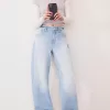 Jeans anni ’90 a gamba larga con risvolto sul fondo