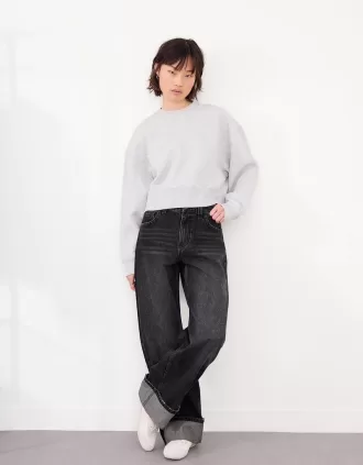 Jeans anni ’90 a gamba larga con risvolto sul fondo