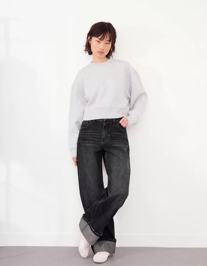 Jeans anni ’90 a gamba larga con risvolto sul fondo