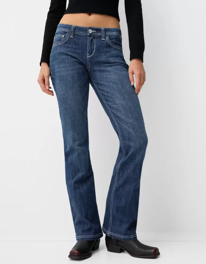 Jeans bootcut a vita bassa con ricami