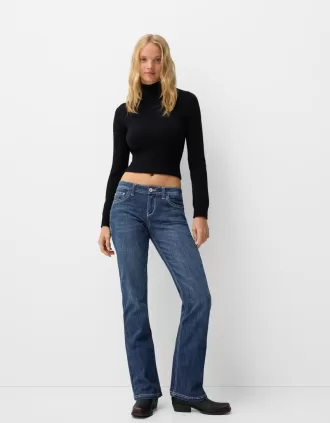 Jeans bootcut a vita bassa con ricami