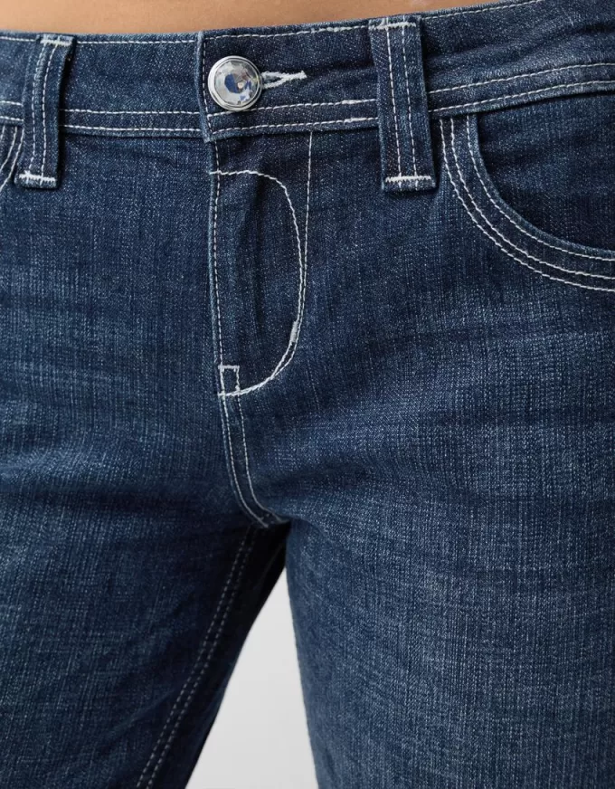 Jeans bootcut a vita bassa con ricami