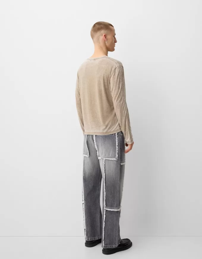 Jeans larghi con frange