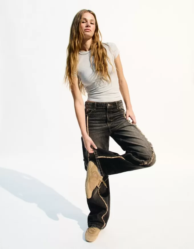 Jeans larghi con frange