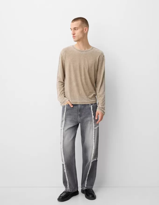 Jeans larghi con frange