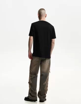 Jeans larghi con toppe