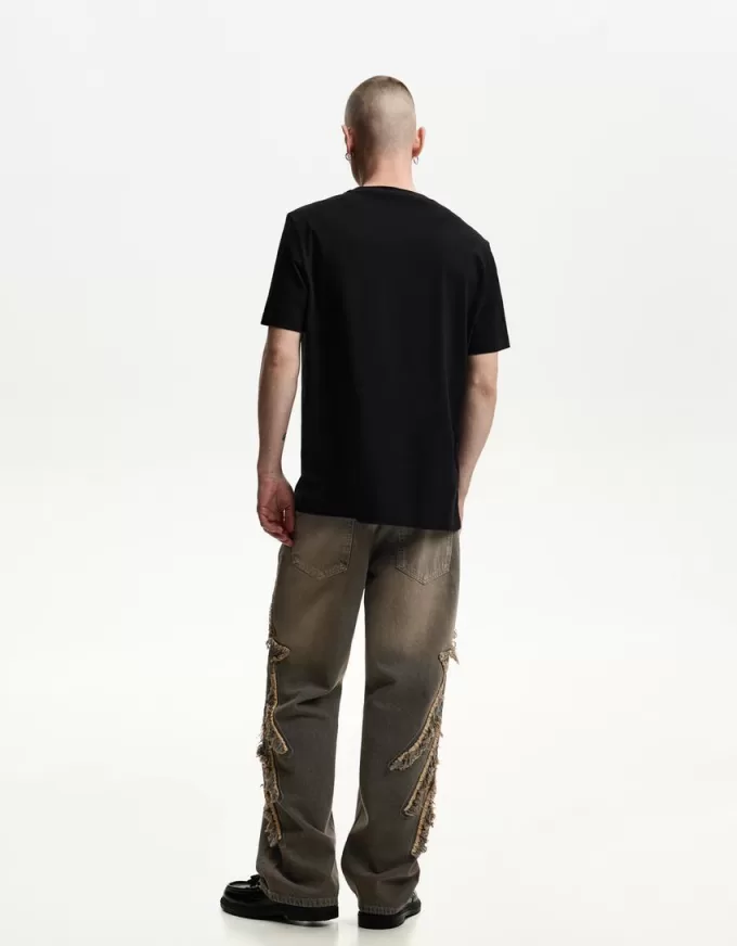 Jeans larghi con toppe