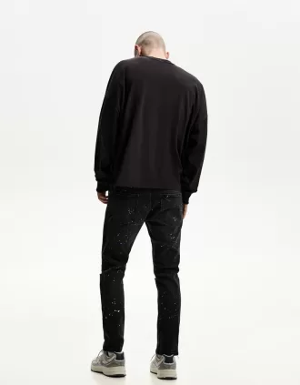 Jeans super skinny strappati