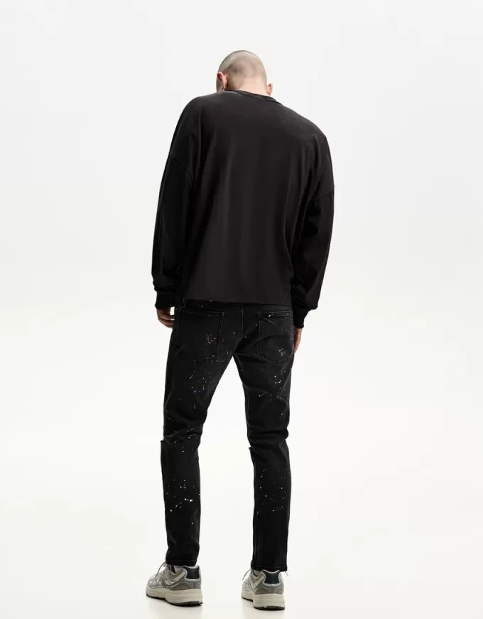 Jeans super skinny strappati