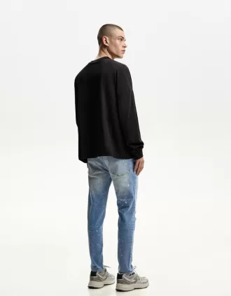 Jeans super skinny strappati
