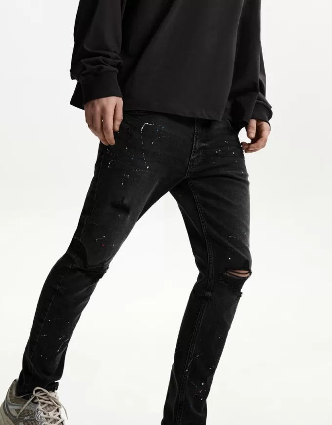 Jeans super skinny strappati