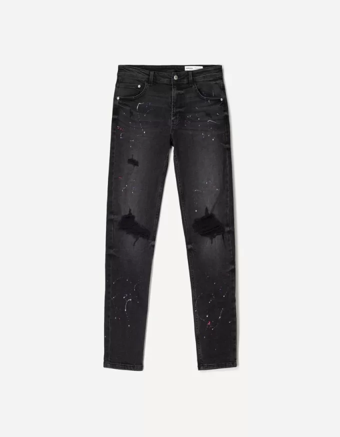 Jeans super skinny strappati