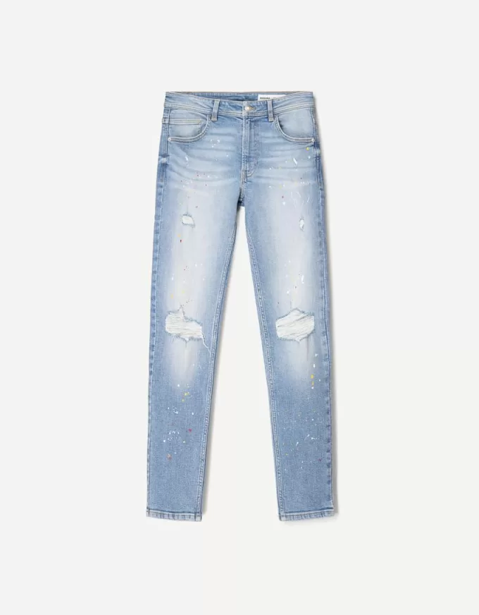 Jeans super skinny strappati