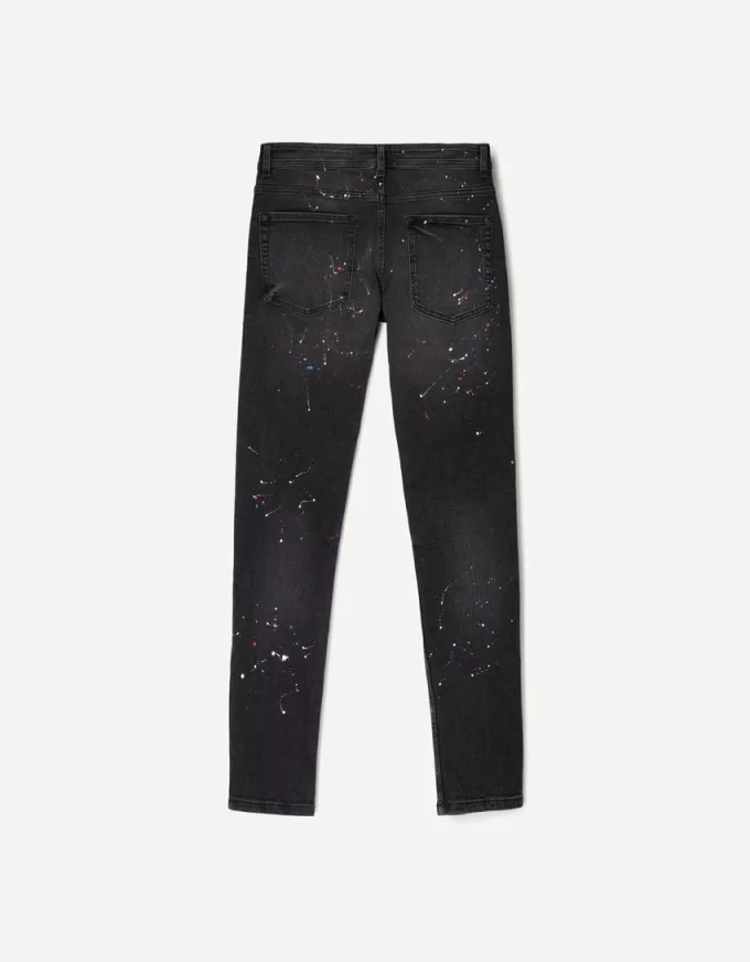 Jeans super skinny strappati