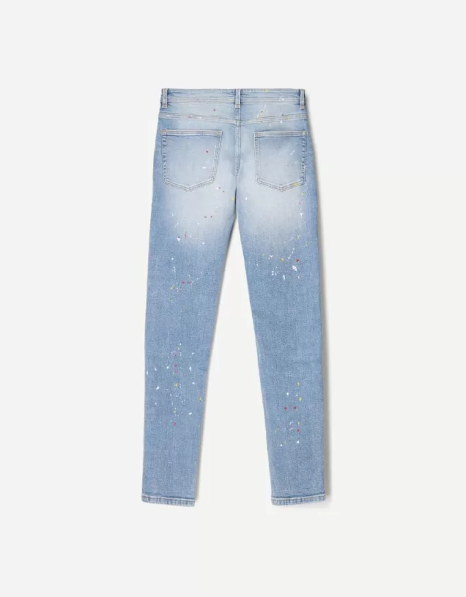 Jeans super skinny strappati