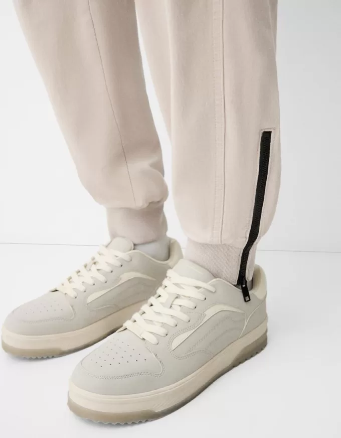 Joggers con cerniere